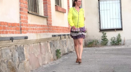 NicolD flaunts her hairy muff while taking a hot pee in public
