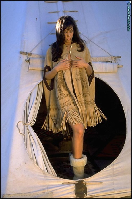 Solo girl Linda Oneil emerges from a tipi before baring her great body