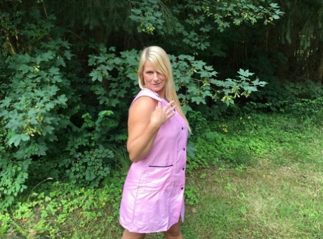 Older blonde amateur Sweet Susi exposes herself in a rural driveway