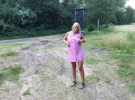 Older blonde amateur Sweet Susi exposes herself in a rural driveway