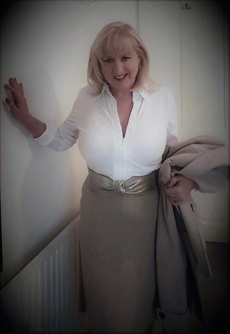 Chubby mature wife Lorna Blu changes form white to red to black sexy lingerie