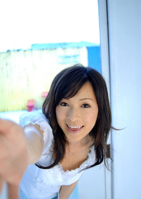 Japanese teen Kaho Kasumi bares big tits and bush while changing lingerie