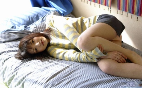 Japanese teen Kanan gets totally naked while changing her clothes at home