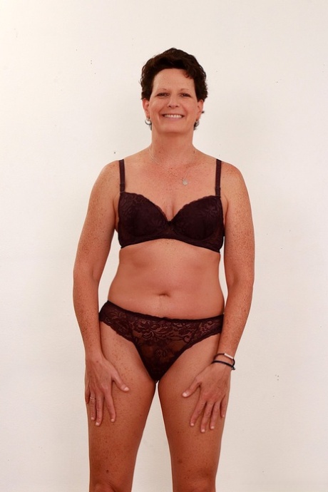 Short haired nan Beth Mckenna ditches her underwear before sucking off a penis