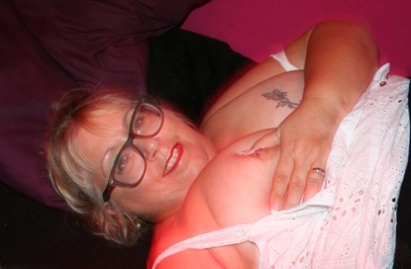 UK fatty Lexie Cummings plays with her strapon cock in ripped hose