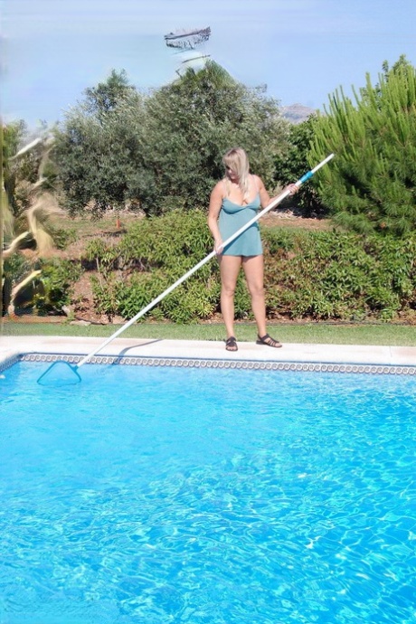 Blond amateur Sweet Susi gets naked in shades after cleaning her swimming pool