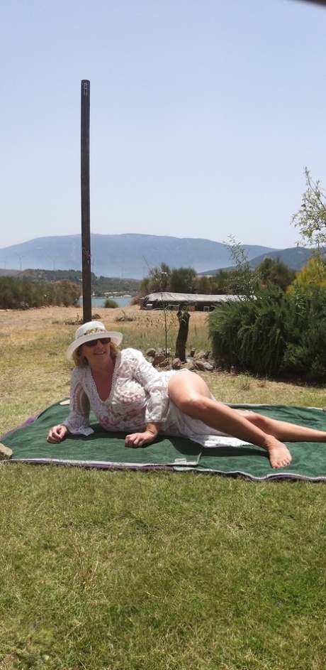 Mature amateur sports a creampie after sex atop a picnic table