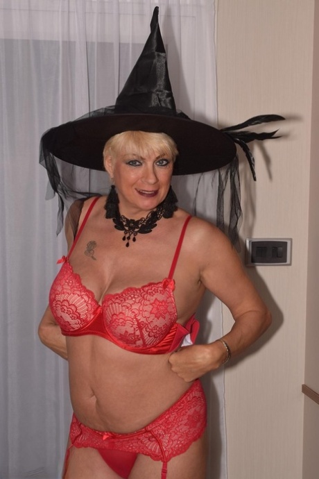 Older blonde Dimonty goes nude in nylons while sporting a witch's hat