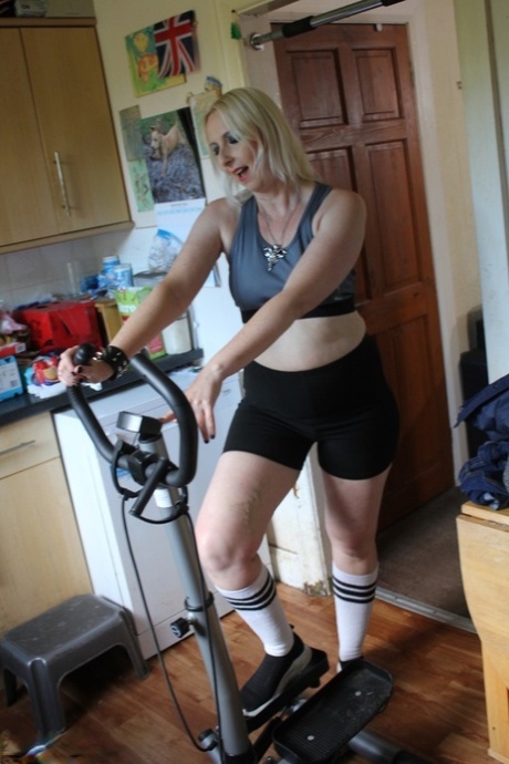 Middle-aged UK blonde Tracey Lain exercises before having POV sex