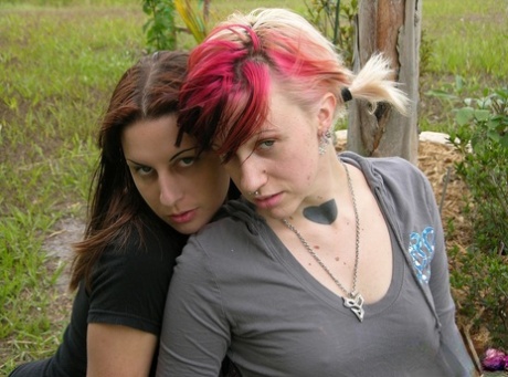 Amateur dykes in blue jeans simultaneously strip naked in a bedroom