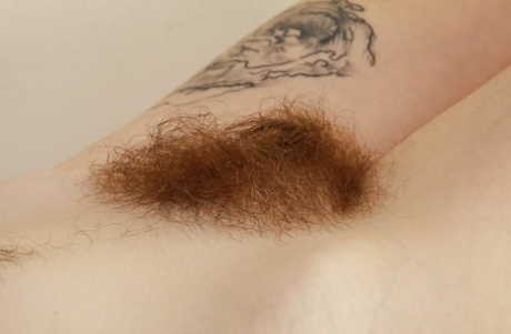 Mature girlie in high-heels Velma is a redhead tart with hairy cavern