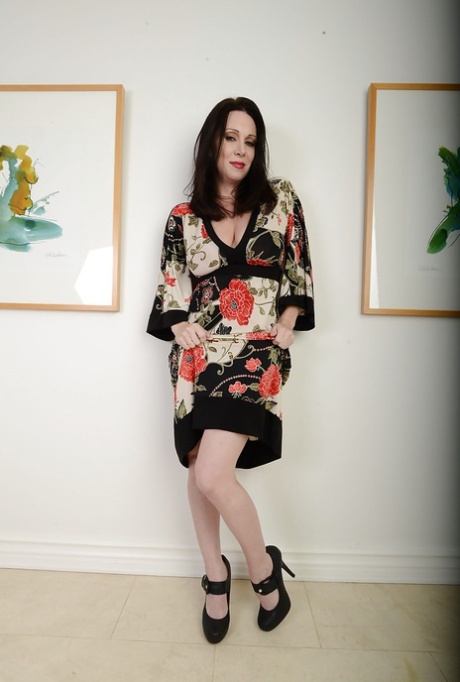 Mature brunette Ray Veness is masturbating and dreaming about dicks
