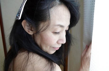 Great looking natural tits on Tsuyako Miyataka who is a hairy mature