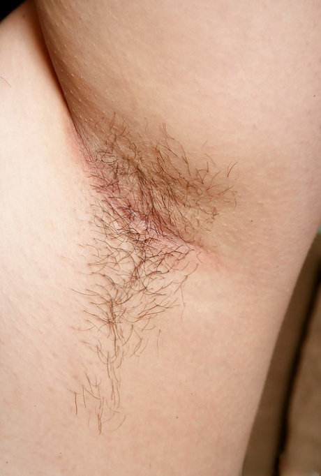 MILF plumper with big boobs sliding underwear aside to bare beaver
