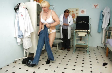 Nasty chubby granny gets her hairy cunt spread wide at the gyno