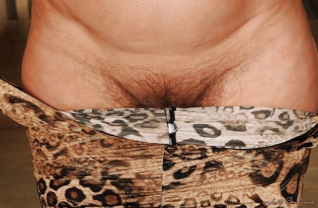 Chubby granny with big flabby boobs slipping off her fancy dress