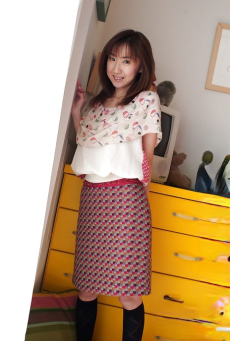 Stunning asian babe Anna Suzukaze stripping off her clothes