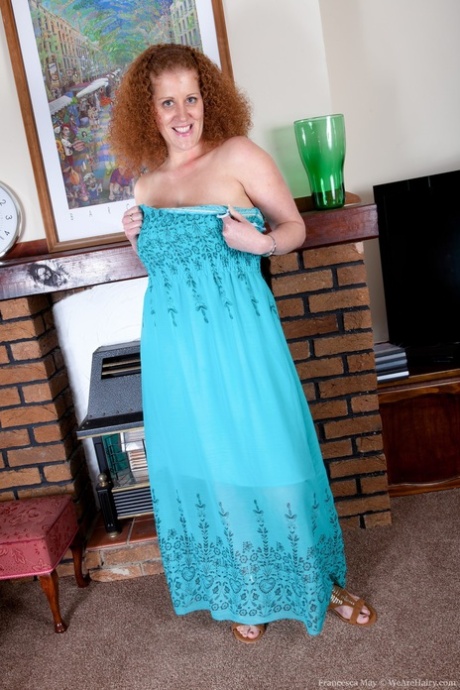 Chubby mature with large breasts Francesca May shows her curvy body