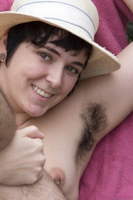 Short haired chick Harley unveils her hairy body, armpits, legs and pussy