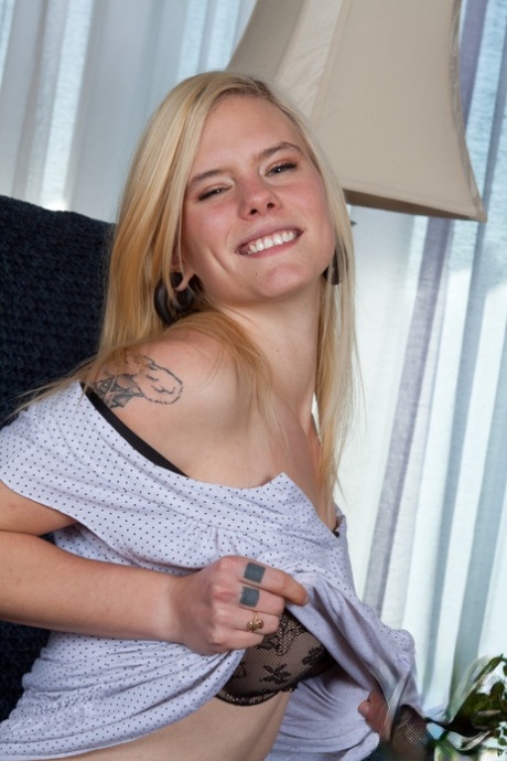 Blonde hottie Usnea grabs her natural tits and shows hairy cunt