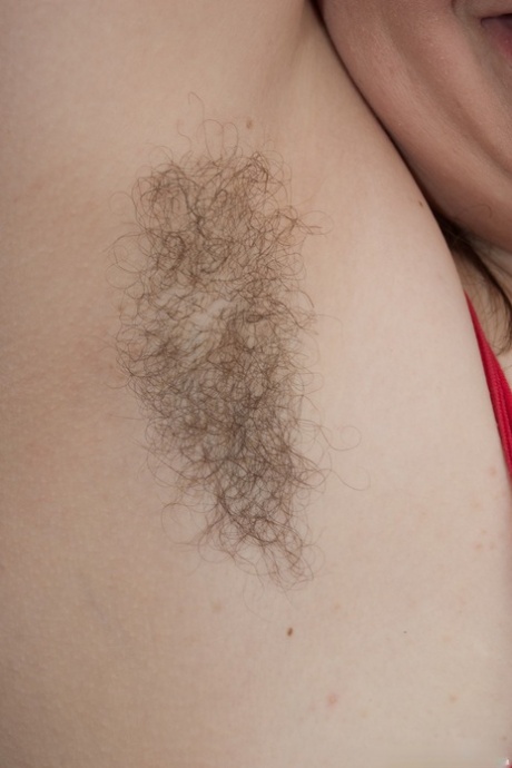 Black haired fatty Esther teases with hairy cameltoe & fingers her furry pussy