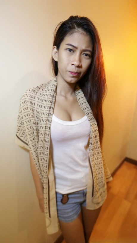 Pretty local Thai babe Jay gets nude at the hotel and shows her hairy twat