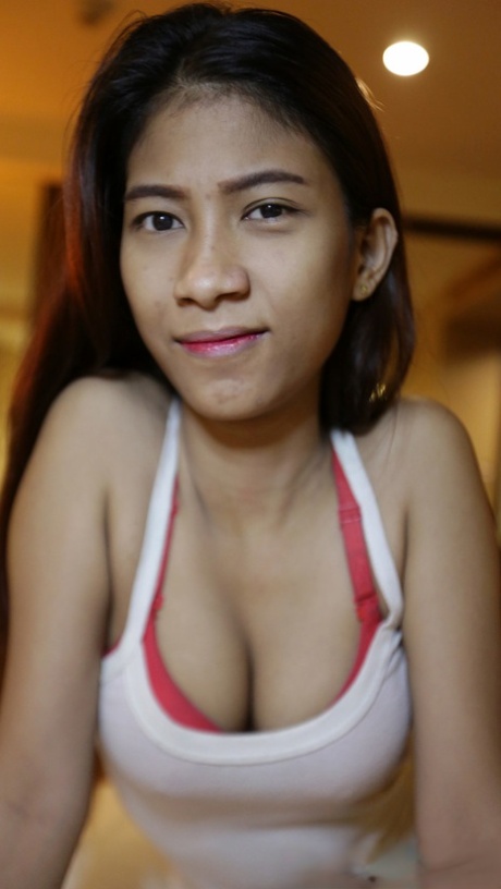 Pretty local Thai babe Jay gets nude at the hotel and shows her hairy twat
