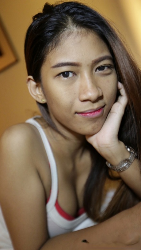 Pretty local Thai babe Jay gets nude at the hotel and shows her hairy twat