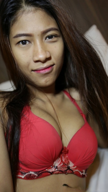 Pretty local Thai babe Jay gets nude at the hotel and shows her hairy twat