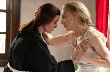 Two sinful nuns Magdalene St. Michaels and Nina Hartley pleasuring each other