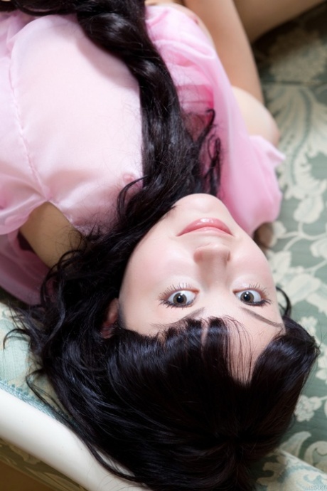 Sweet teen with an adorable face Mirelle A flaunts her amazing tits in a solo