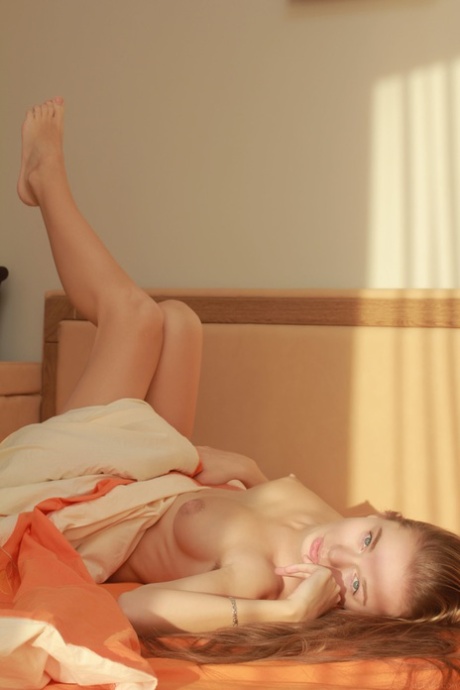 Beautiful angelic babe Milena D shows her hairy pussy & flaunts her sexy feet