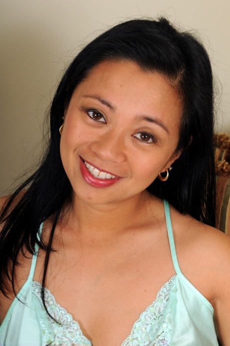 Pretty Asian MILF Lucky peels her lingerie off and shows her big ass & beaver