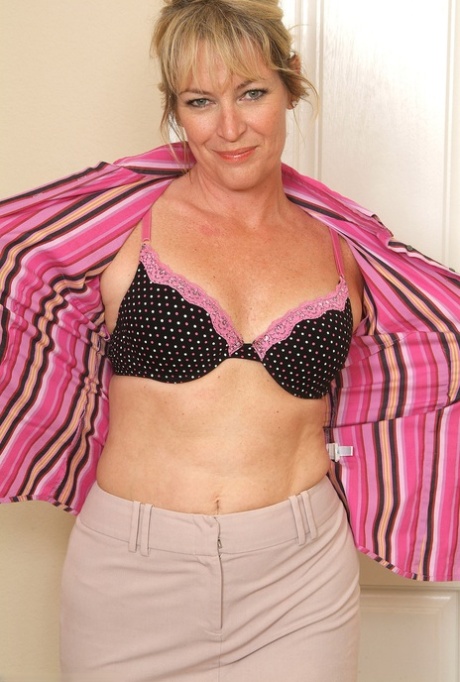 Sexy MILF Tina takes off her work outfit & shows off her big ass & hairy pussy