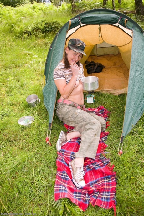 MILF Caylian Curtis strips off her military outfit and poses while camping