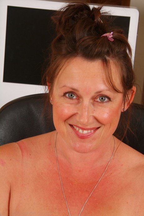 Chubby secretary Marishka strips and spreads her furry pussy at the office