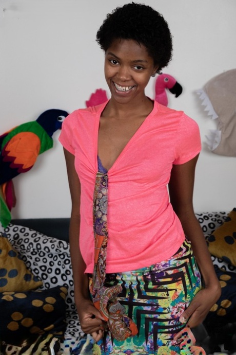 Ebony with small boobs Ashlee L toys her hairy vagina after stripping