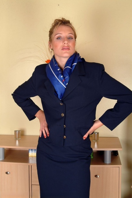 Sexy stewardess Angelina loses her uniform and spreads her hairy vagina