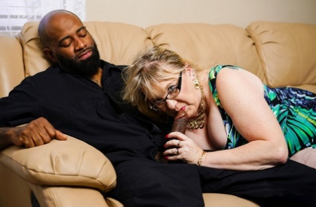 Chubby mature woman with big saggy tits gets screwed by her black lover