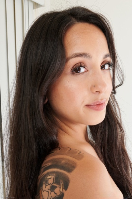 Adorable Asian brunette Mi Ha Doan unveils her hairy holes after stripping