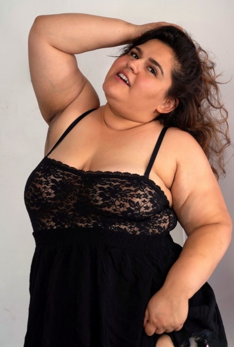 Chubby brunette Karla Lane displays her fat tight pussy up close