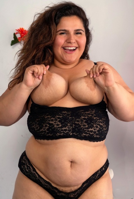 Chubby brunette Karla Lane displays her fat tight pussy up close