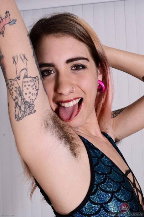 Slender Russian amateur Pearl Sage spreads her very hairy pussy up close