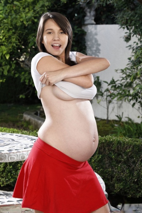 Pregnant hottie Cece Capella showing her furry muff and big booty up close