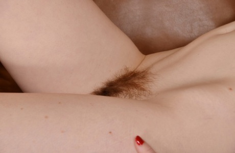 Redheaded amateur hippie Nico Sweet flaunts her firm ass and hairy holes