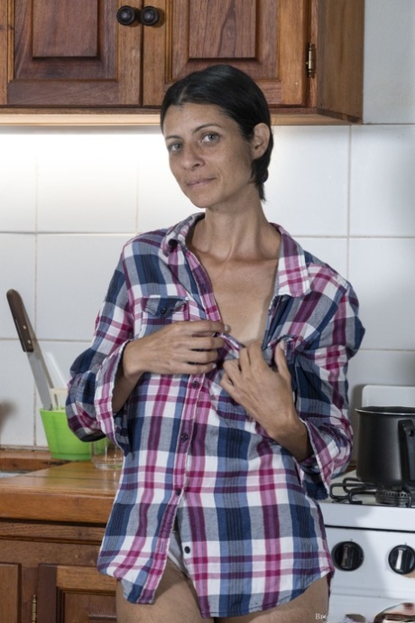 Amateur mom with tiny tits Bruna undressing and flaunting her hairy twat