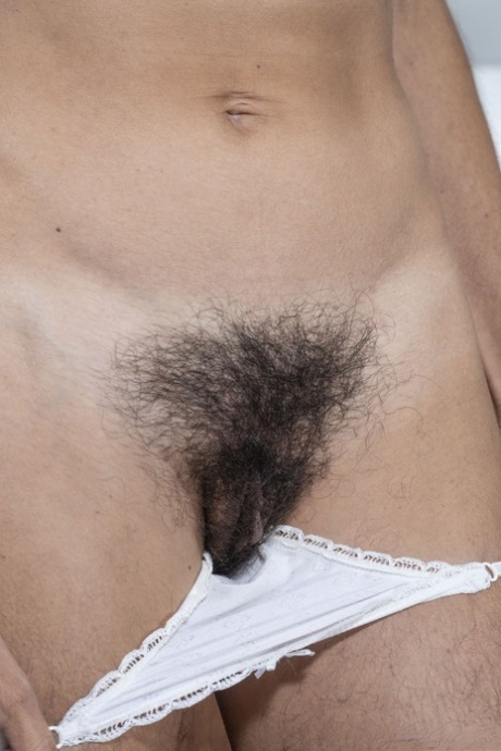 Amateur mom with tiny tits Bruna undressing and flaunting her hairy twat