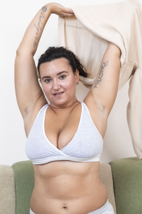 Chubby American Ramira reveals her big natural juggs, round ass & hairy pussy