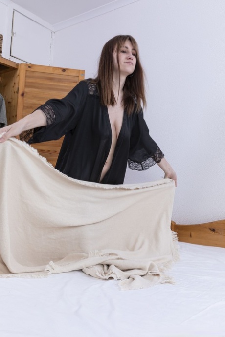 Amateur housewife Emily Rose shows her big saggy tits while fingering herself