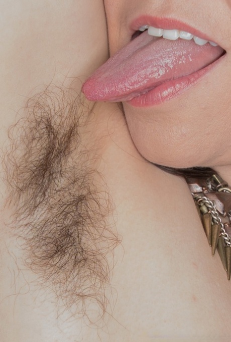 Hairy amateur Nikki Silver playing with her jiggle balls after a sexy strip
